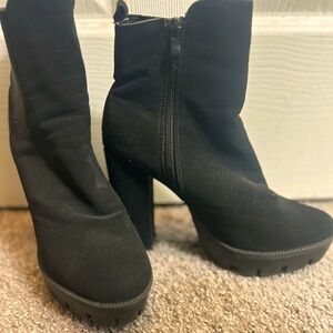 High heel boots color black only wore once.